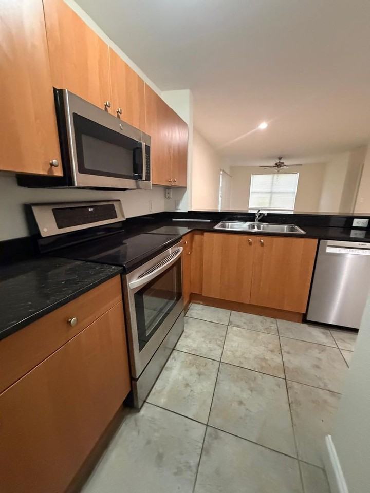 1825 1825 Palm Cove Blvd Uni8t 105 - Photo 2 of 21