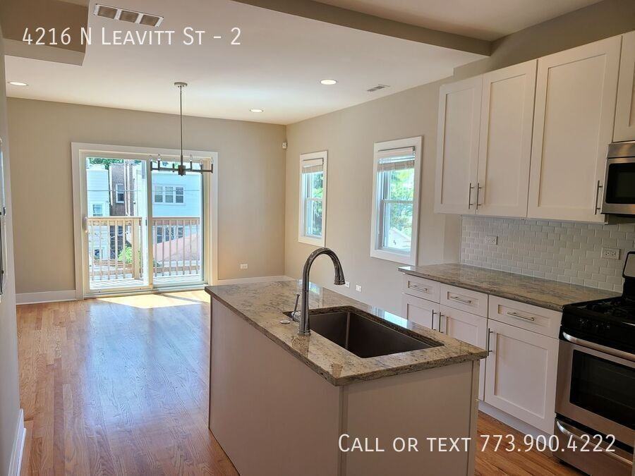 4216 N Leavitt St #2 - Photo 6 of 24