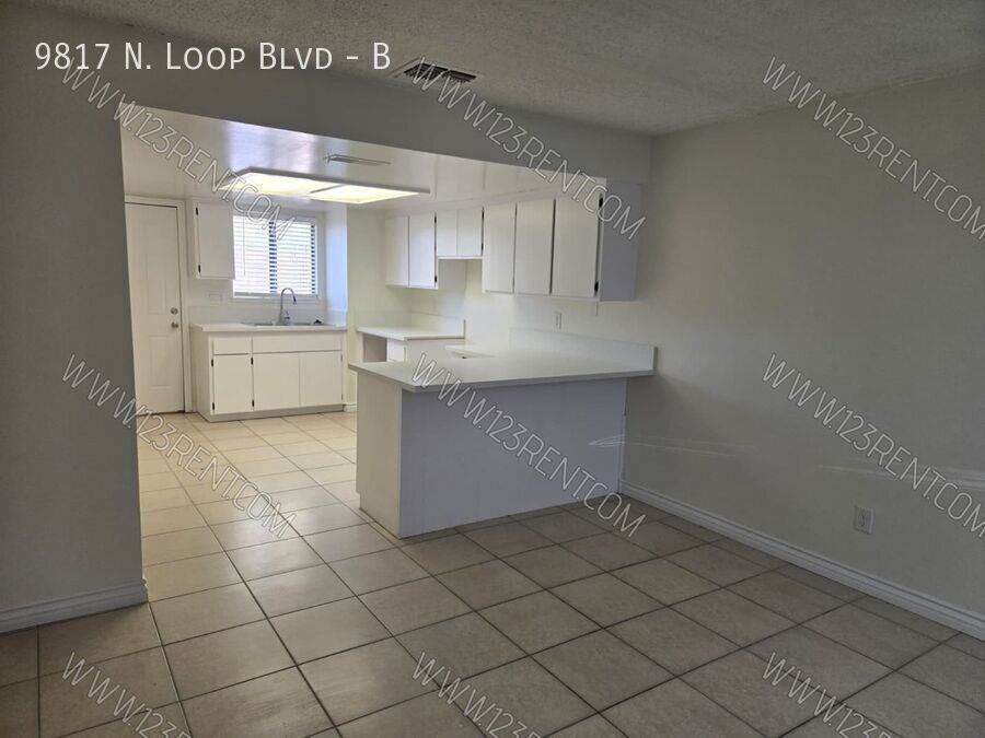 9817 N Loop Blvd #B - Photo 3 of 16