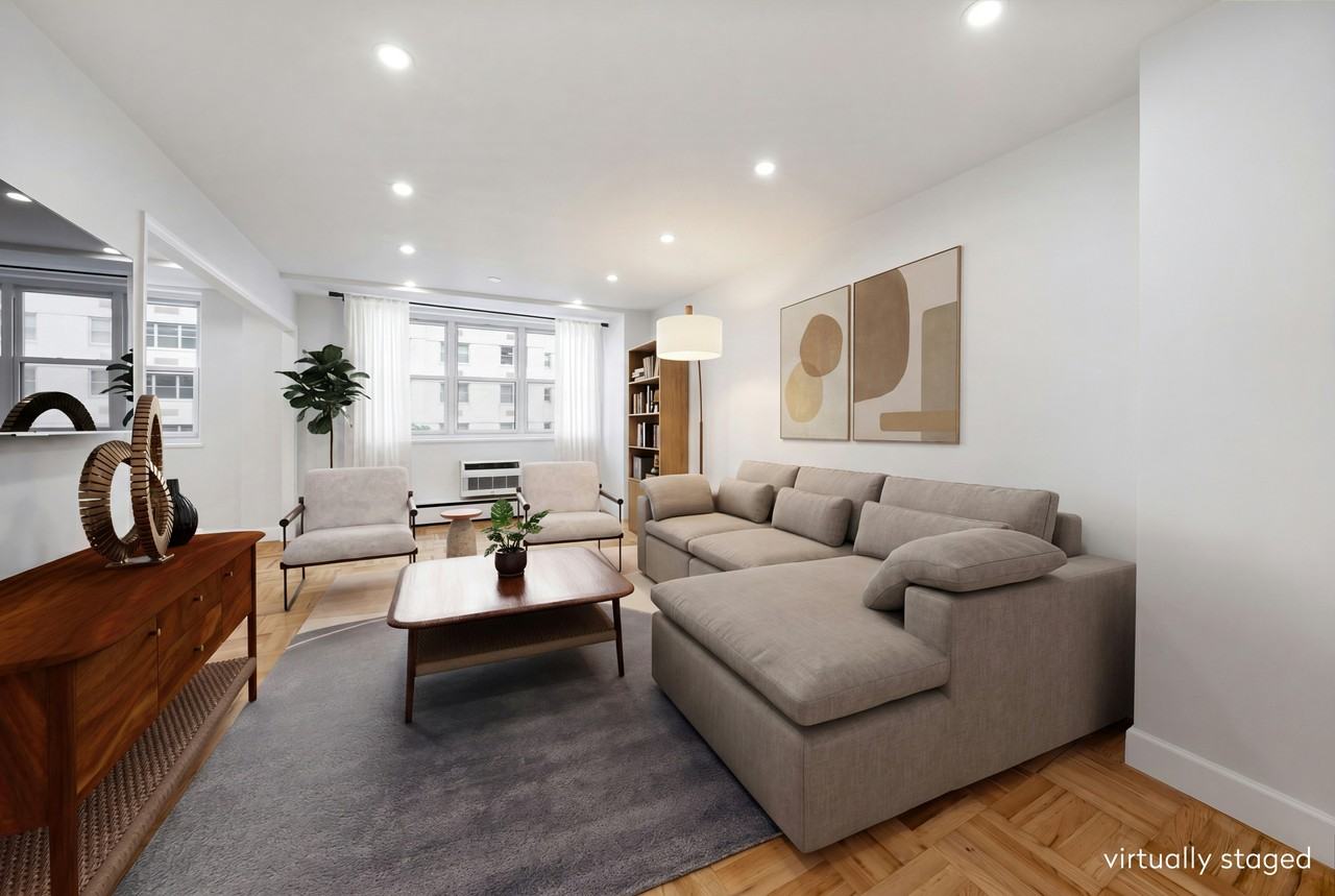 63 E 9th St #6M