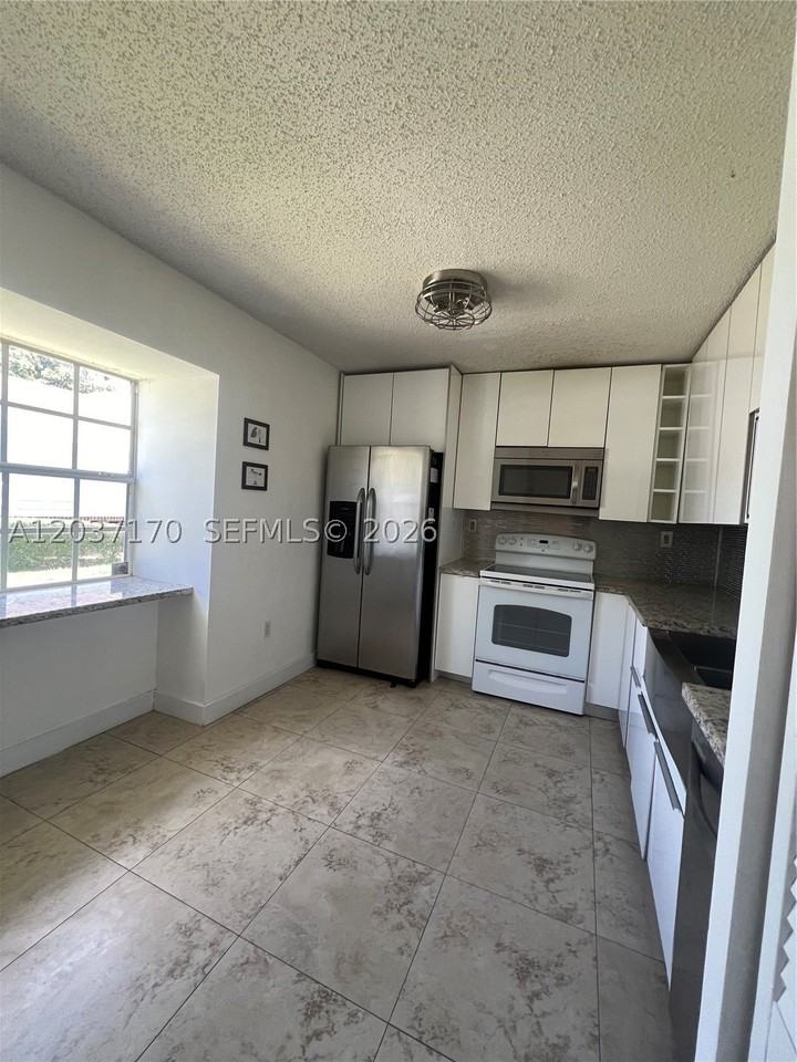 13742 Sw 147th Circle Ln #2-27 - Photo 4 of 15