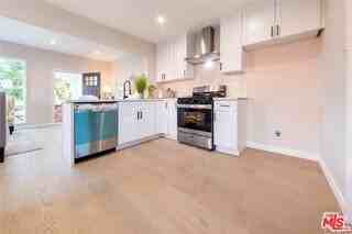 1435 W 71st St - Photo 7 of 8