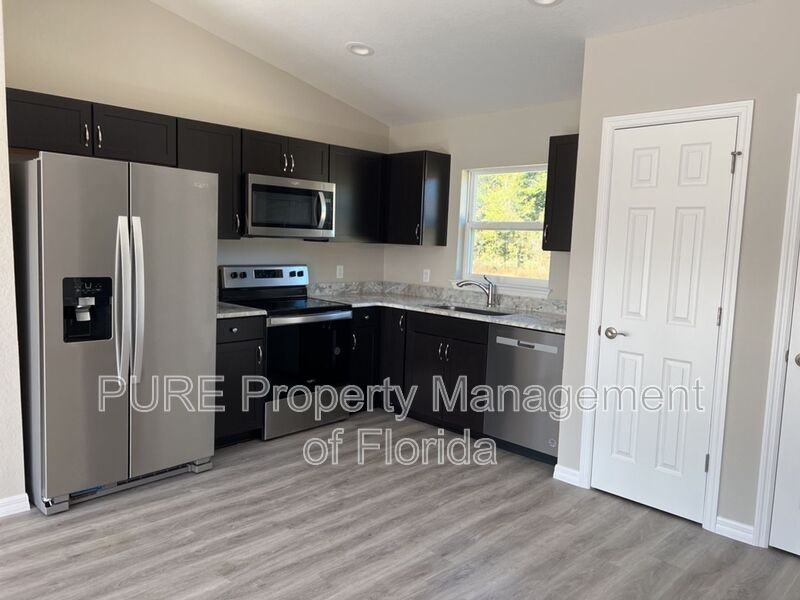 6577 Sw 140th Place Rd #2 - Photo 6 of 18