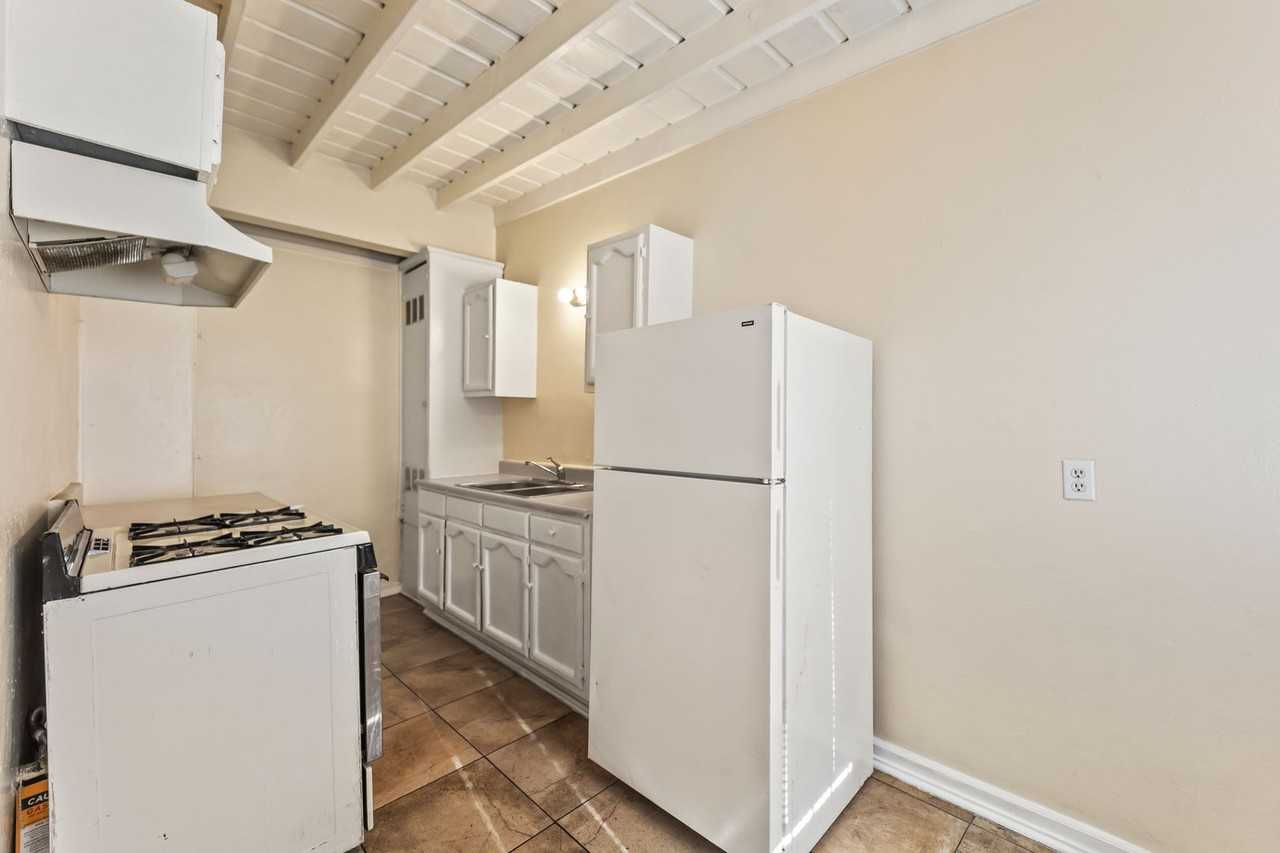 709 1/2 E 108th St - Photo 6 of 15
