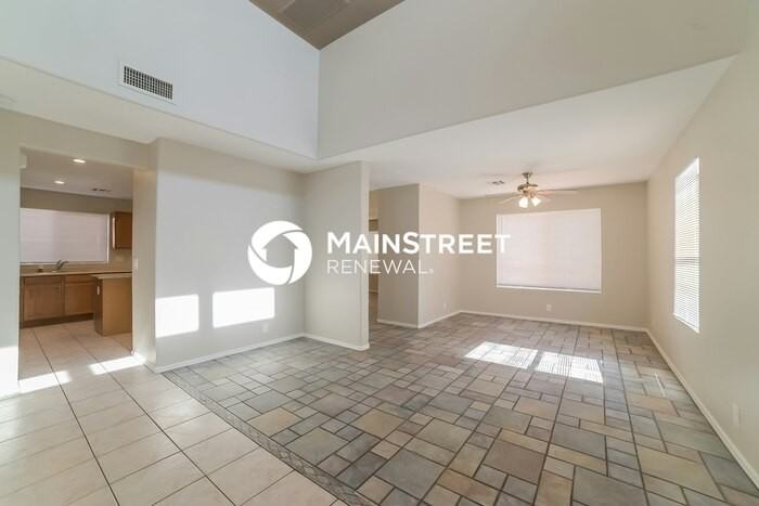 8645 W Mauro Ln - Photo 5 of 17