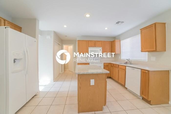 8645 W Mauro Ln - Photo 6 of 17