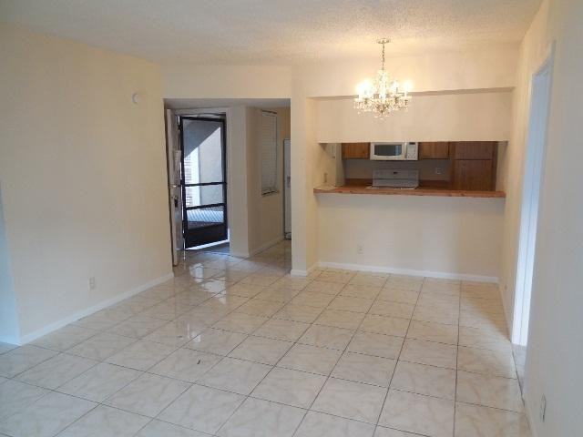 8393 Royal Palm Boulevard #102 - Photo 2 of 7