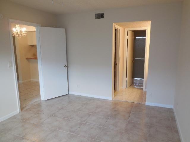 8393 Royal Palm Boulevard #102 - Photo 4 of 7