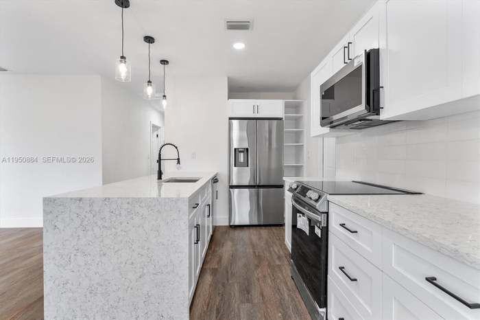 1950 Nw 57th St - Photo 6 of 10