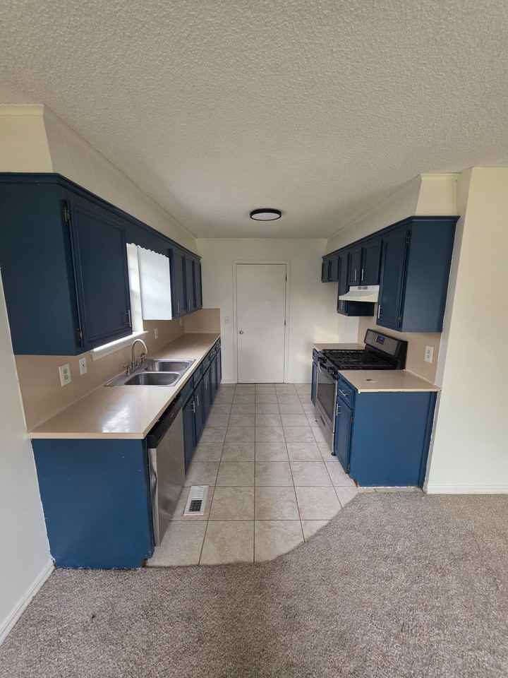 12624 E 33rd Ct - Photo 5 of 15