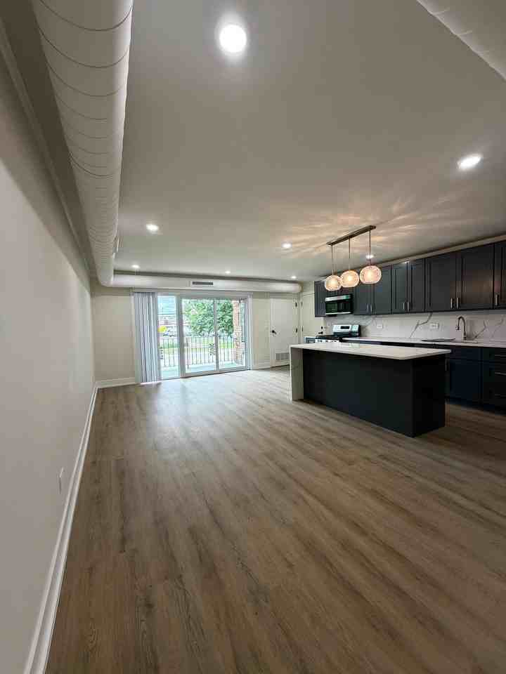 10225 Dearlove Rd #102 - Photo 6 of 20
