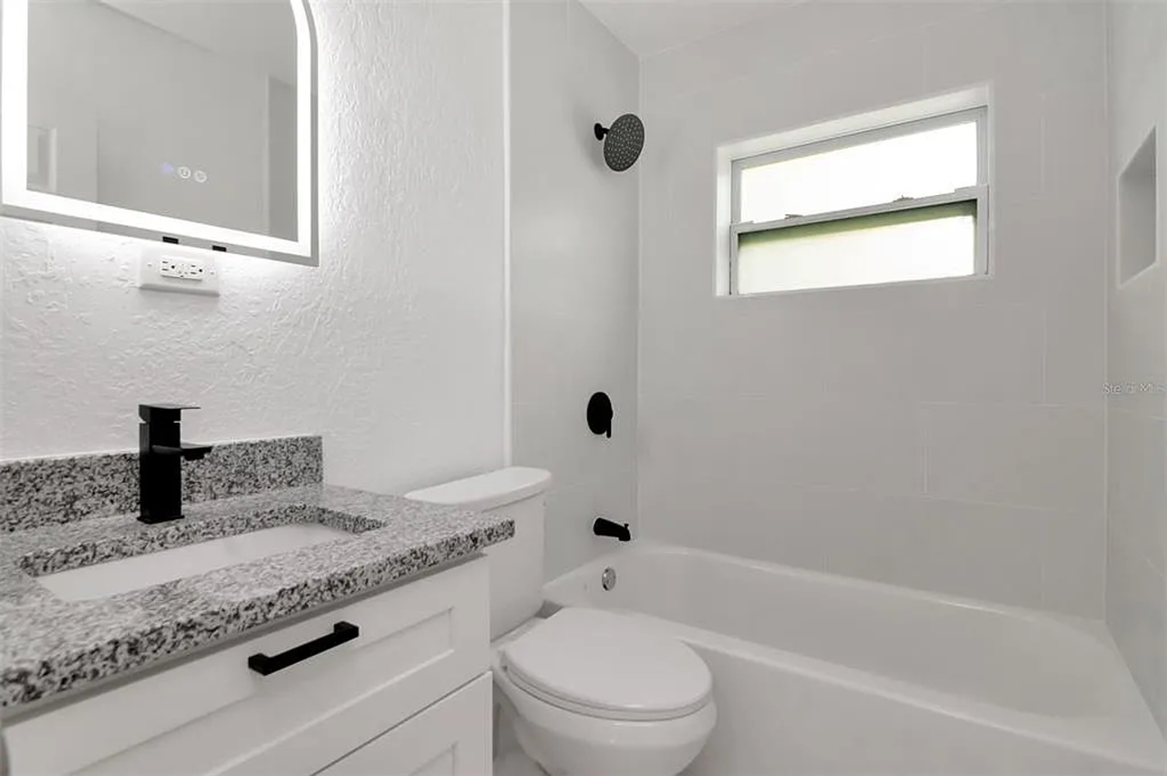 7148 Ramor Ln - Photo 5 of 9