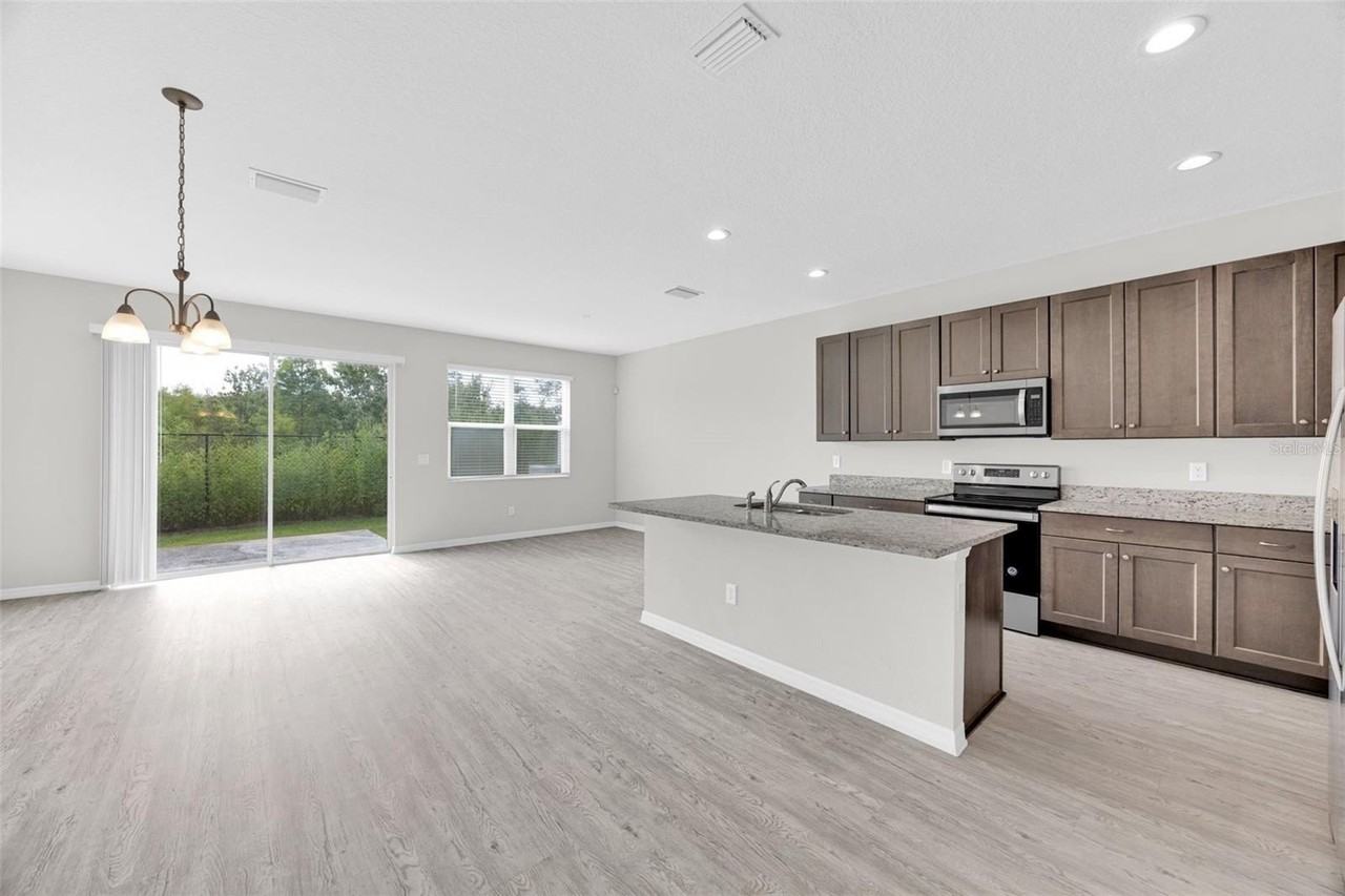 6321 Tillandsia Pl - Photo 6 of 34