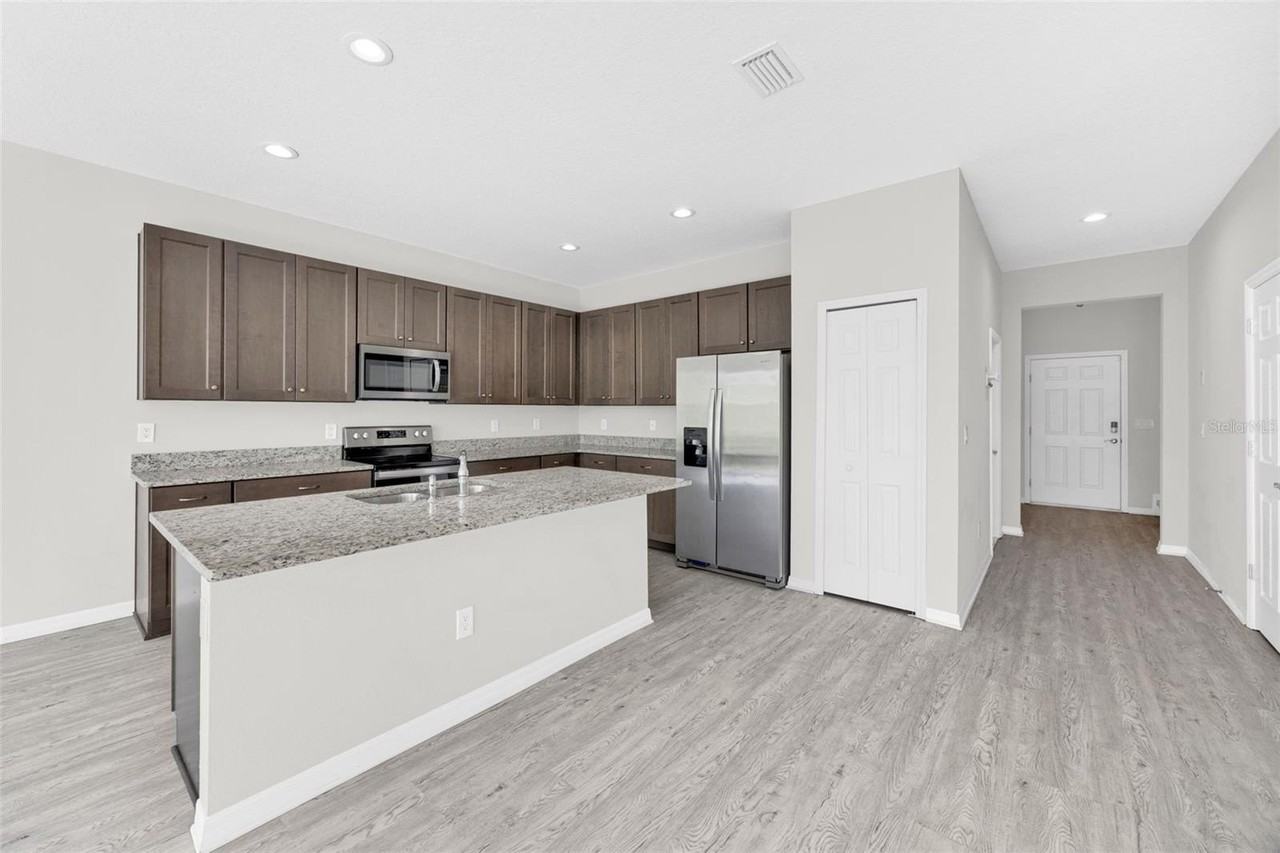 6321 Tillandsia Pl - Photo 7 of 34