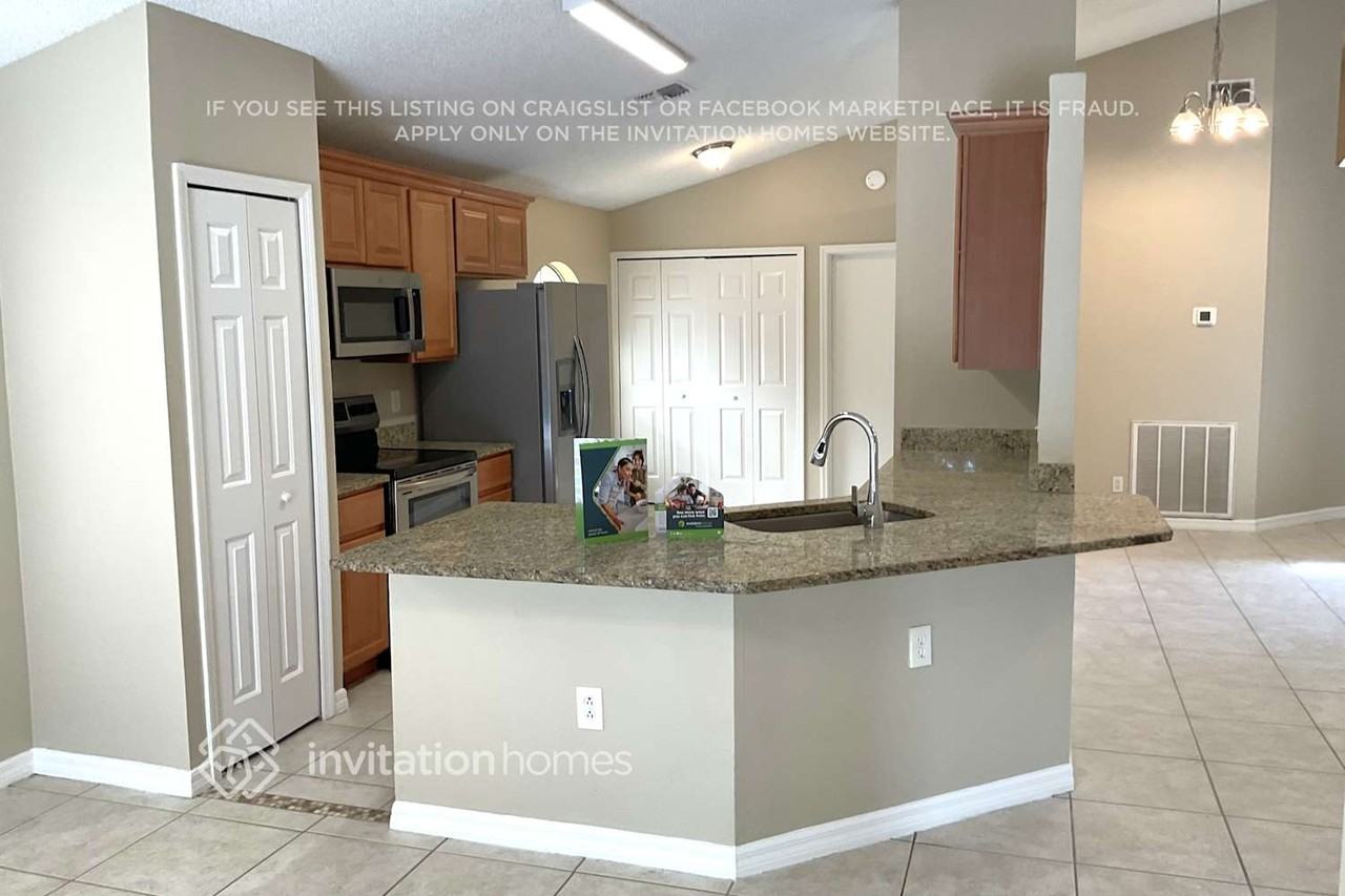 6879 Raccoon Ct - Photo 4 of 16