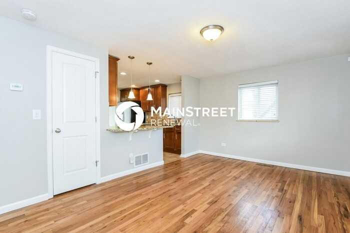 4675 S Acoma St - Photo 4 of 17