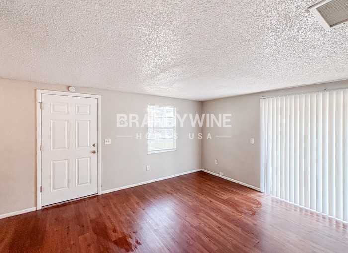 7308 S Kissimmee St - Photo 4 of 18