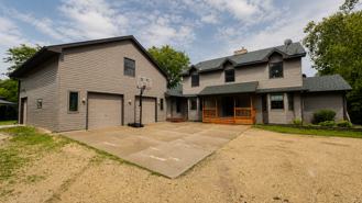9533 Lansing Ave N - Photo 1 of 1