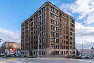 Comfortable Urban Living in a Classic Brick Building Near UW & Light Rail - Photo 1 of 1