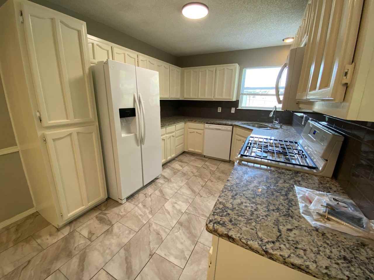 10703 E 65th St - Photo 5 of 28