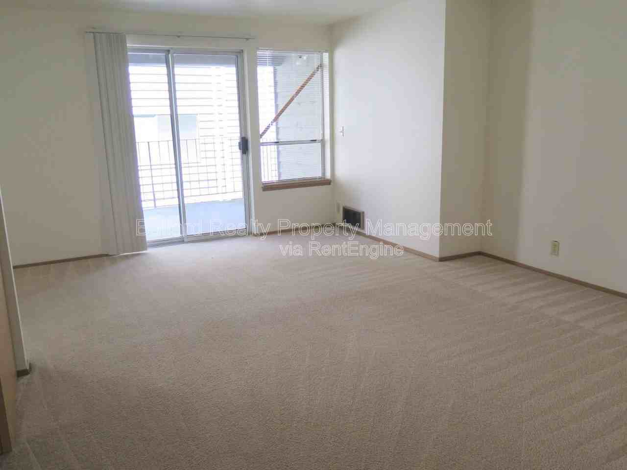 3232 21st Ave W #102 - Photo 2 of 9