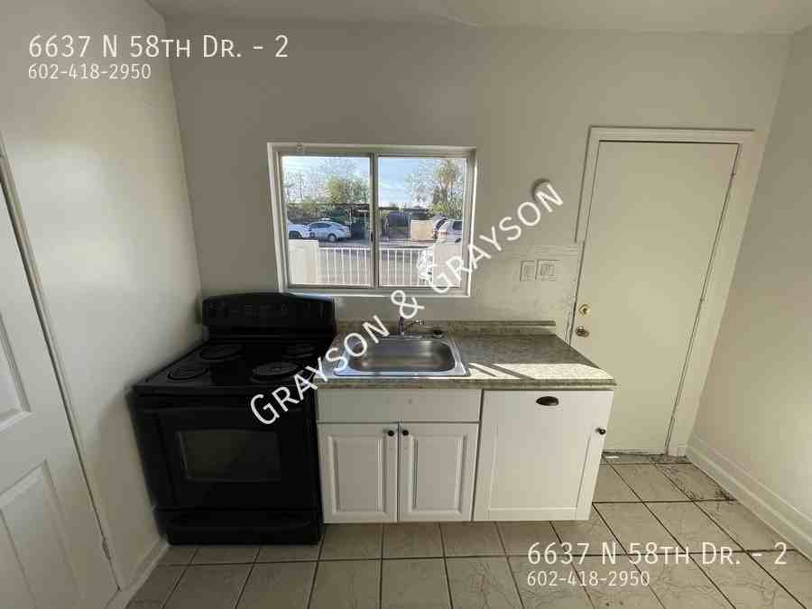 6637 N 58th Dr #2 - Photo 3 of 11