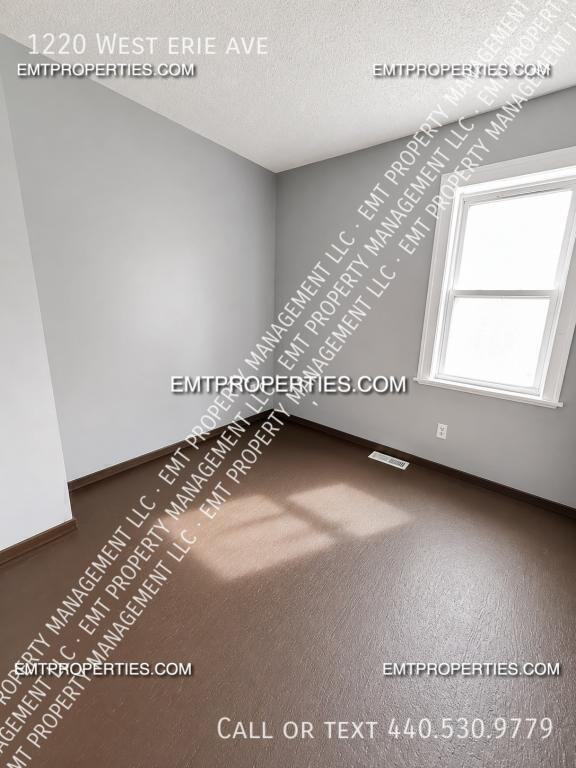 1220 W Erie Ave - Photo 4 of 8