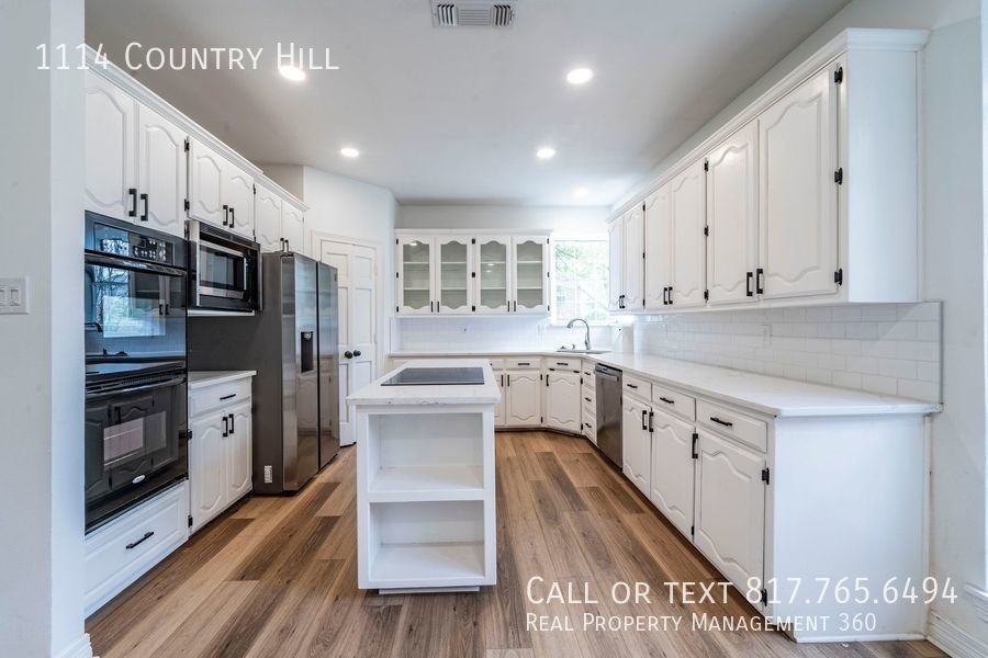 1114 Countryhill Dr - Photo 7 of 26