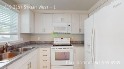 619 21st St W - Photo 5 of 16