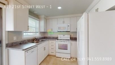 619 21st St W - Photo 7 of 16
