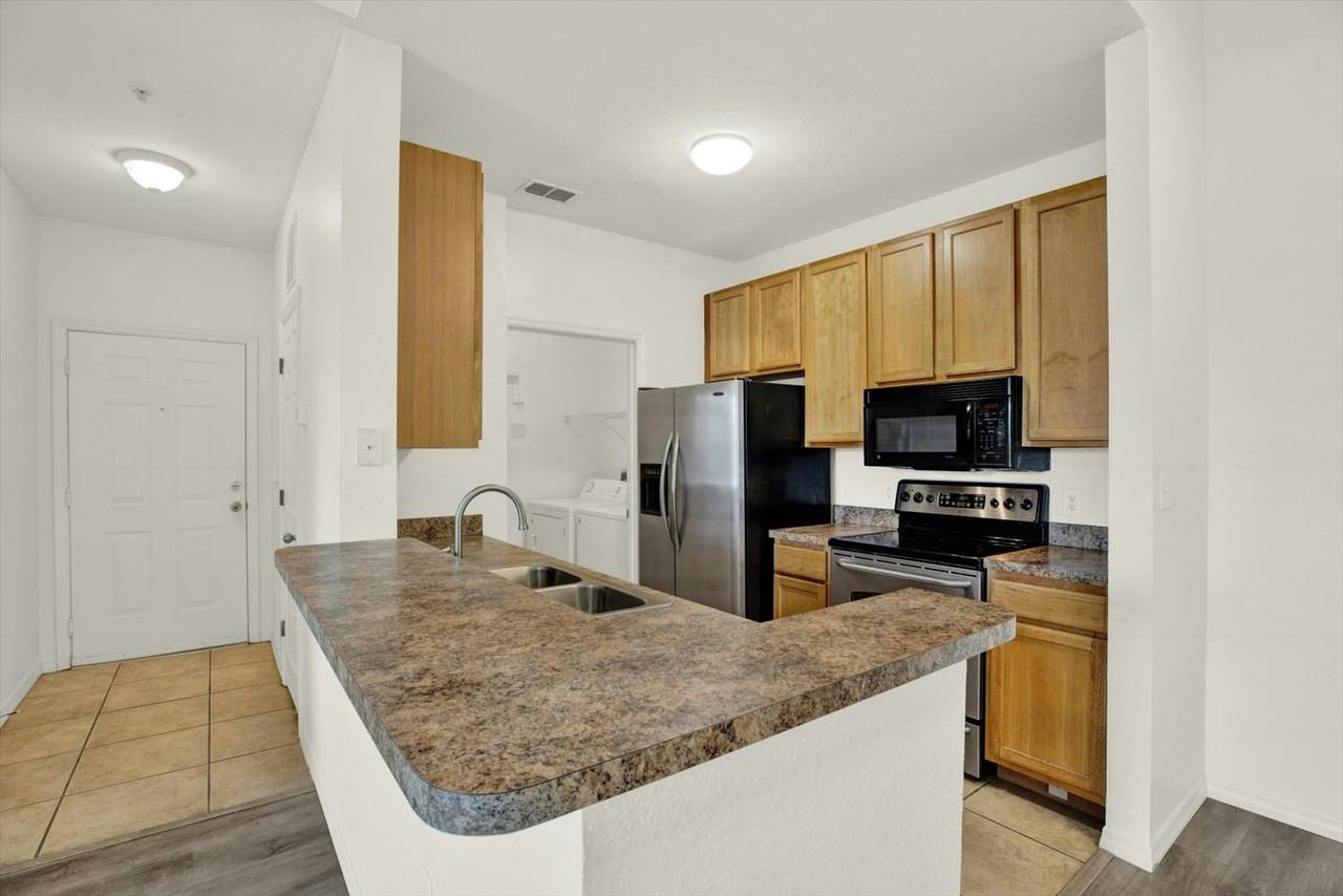 10201 Courtney Palms Boulevard, Unit 304 - Photo 6 of 45