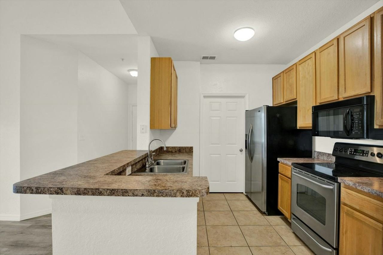 10201 Courtney Palms Boulevard, Unit 304 - Photo 7 of 45
