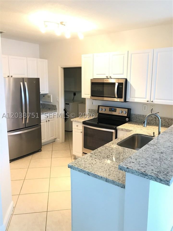 6674 Nw 107th Pl - Photo 4 of 23