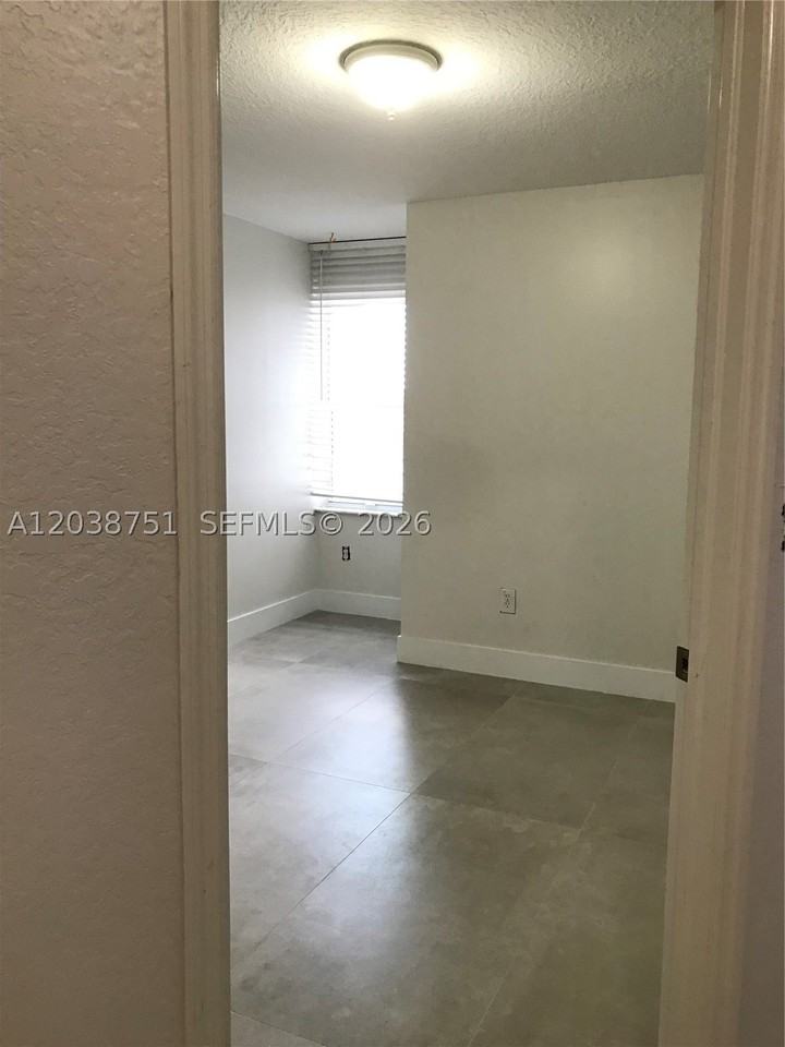 6674 Nw 107th Pl - Photo 7 of 23