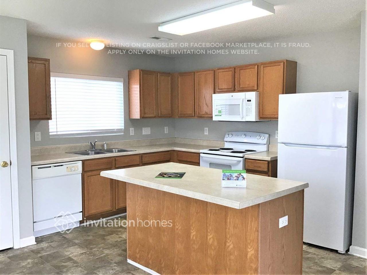 1136 Tellis Dr - Photo 5 of 18