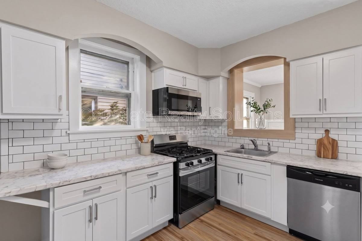 7109 Eugene Ave - Photo 2 of 10