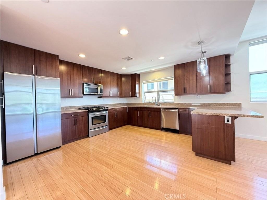 12908 Bloomfield St #103 - Photo 7 of 24