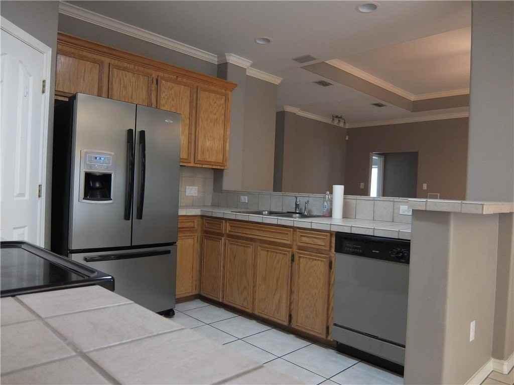 2505 Windrose Dr - Photo 3 of 13