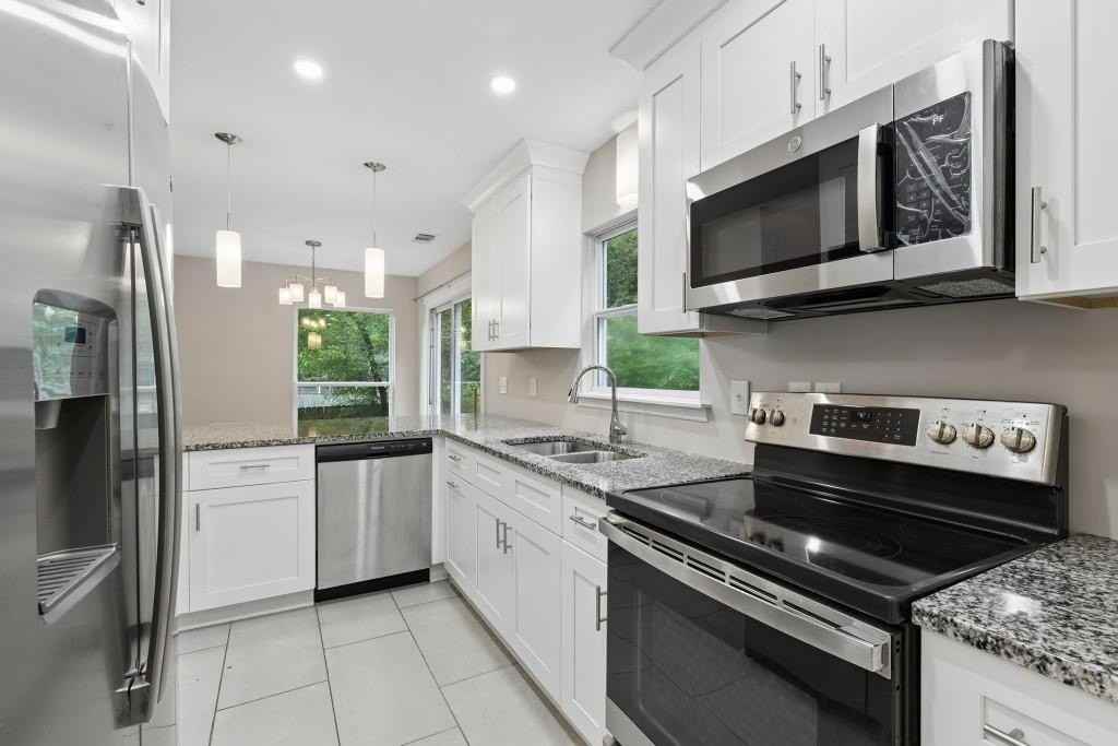 4930 Farmstead Ct Ne - Photo 4 of 32