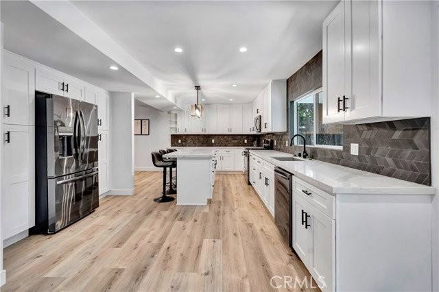 24445 Clipstone St - Photo 7 of 8