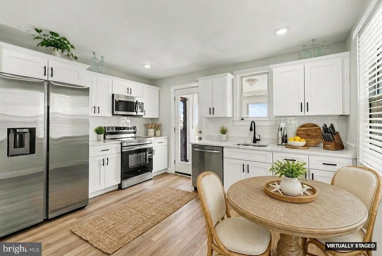 9135 Cuckold Point Rd - Photo 6 of 49