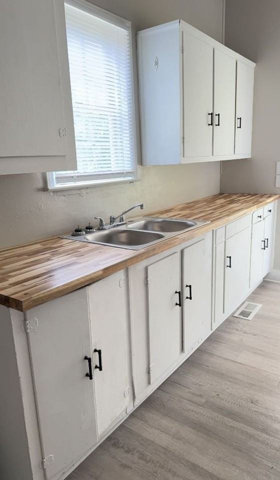 410 Mosley St - Photo 4 of 9