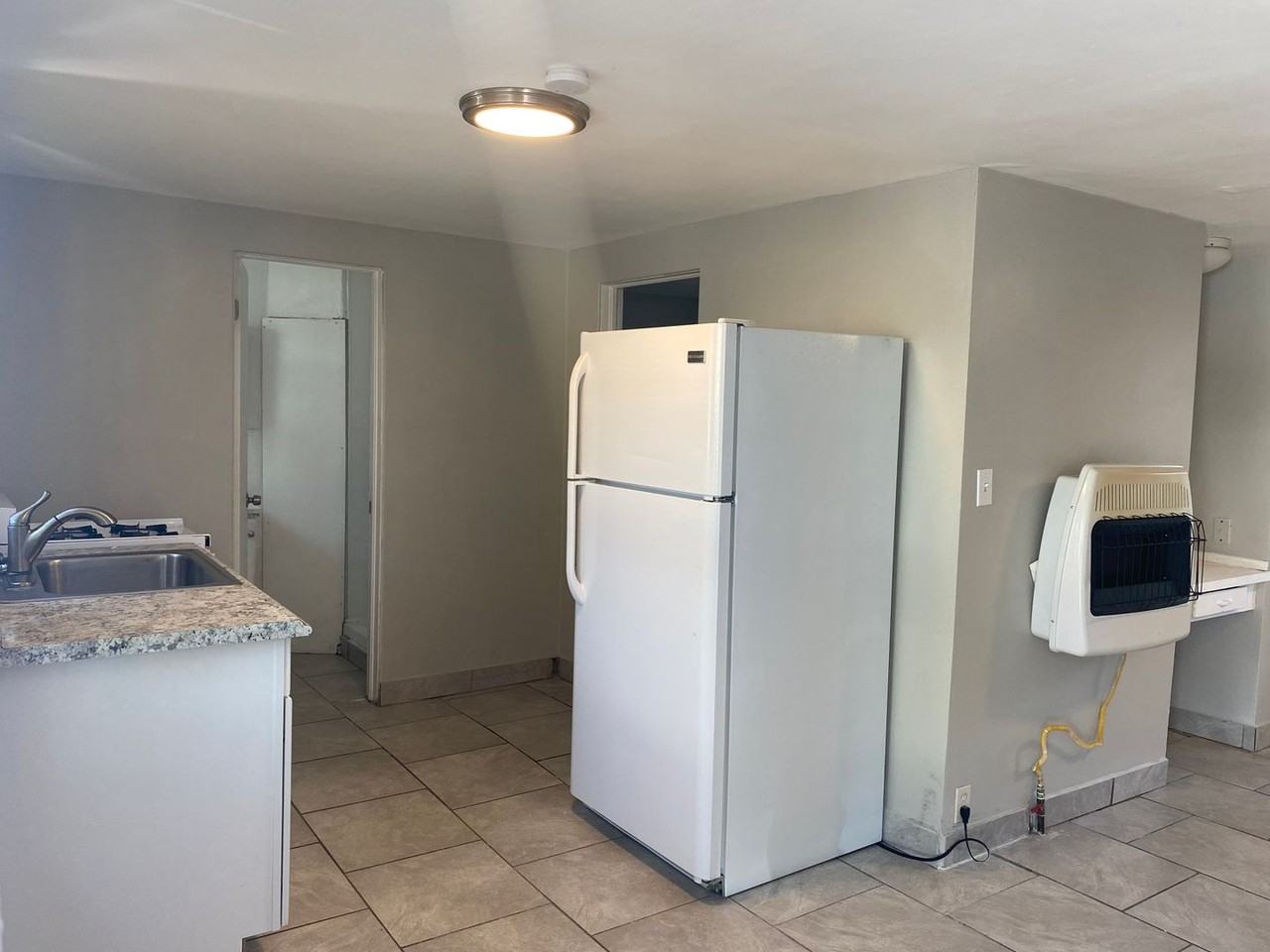 Swope Ave Apartments - Photo 5 of 19