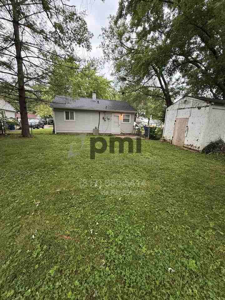 7387 E 54th St - Photo 3 of 25