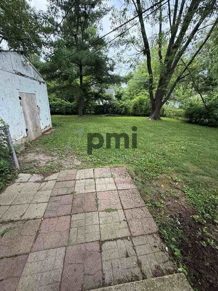 7387 E 54th St - Photo 4 of 25