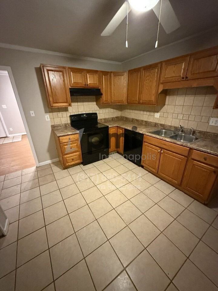 7387 E 54th St - Photo 5 of 25
