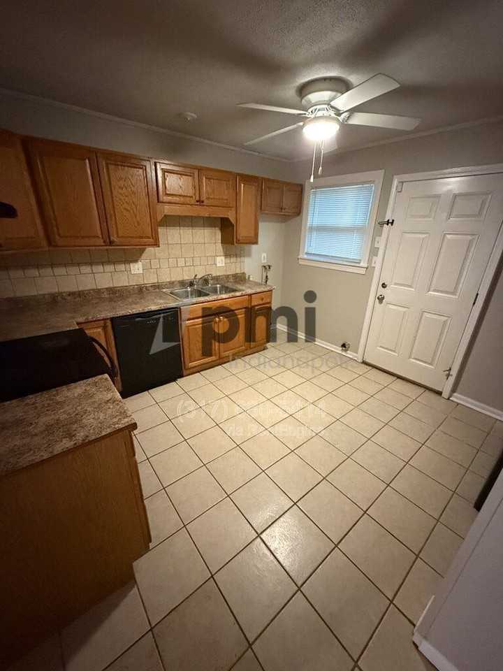7387 E 54th St - Photo 6 of 25