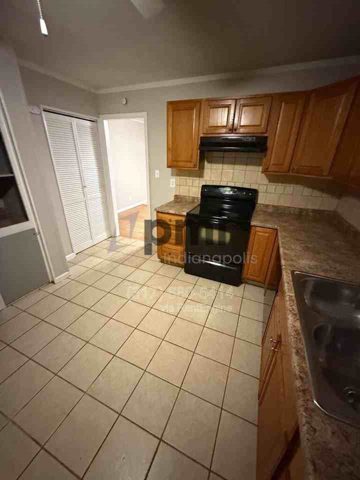 7387 E 54th St - Photo 7 of 25