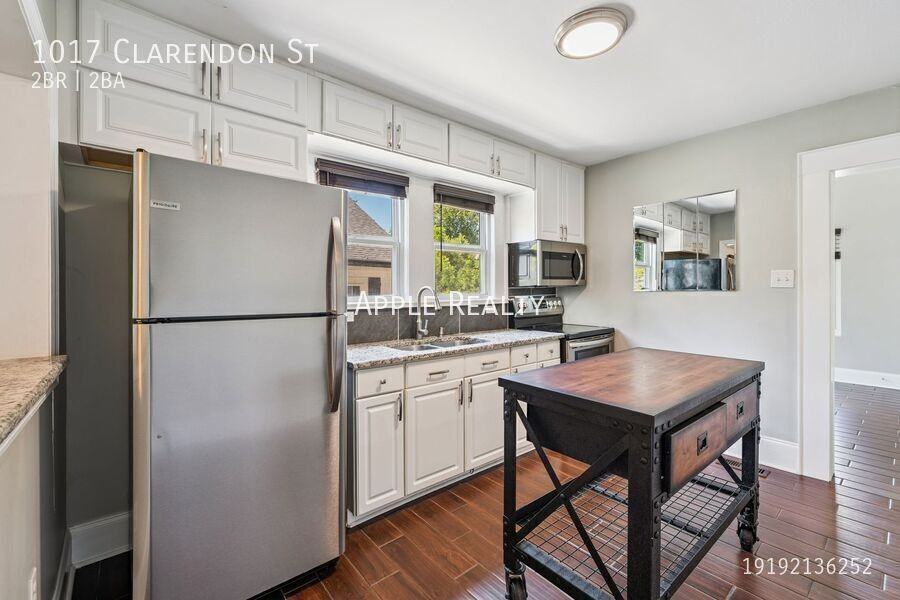 1017 Clarendon St - Photo 6 of 14