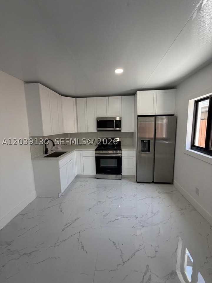1230 Nw 135th St - Photo 2 of 6